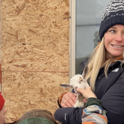 Guest family with baby goat